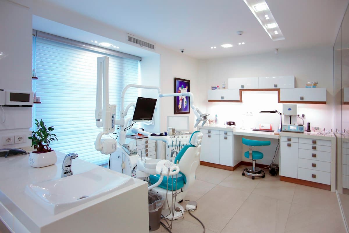 Dental treatment room with a chair and equipment