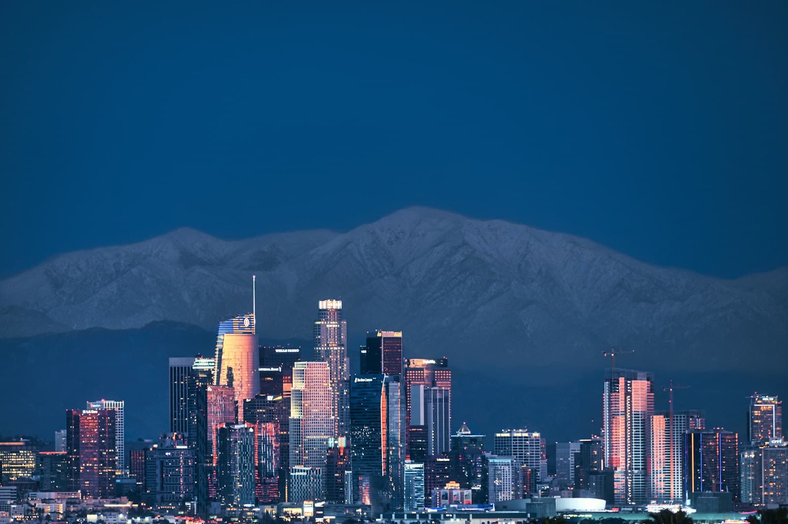 Downtown Los Angeles skyline with mountains behind it
